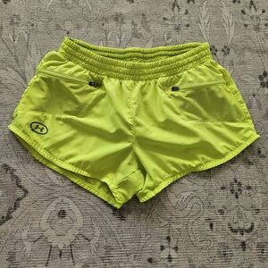 Women's size small under armour neon yellow high visibility running shorts